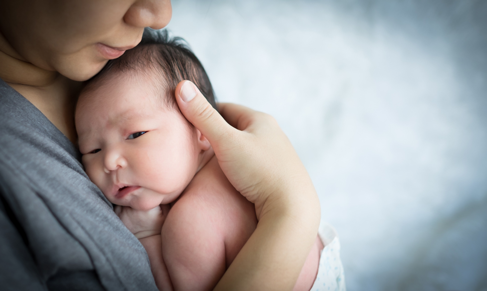 Substance use image of baby in parent arms.png